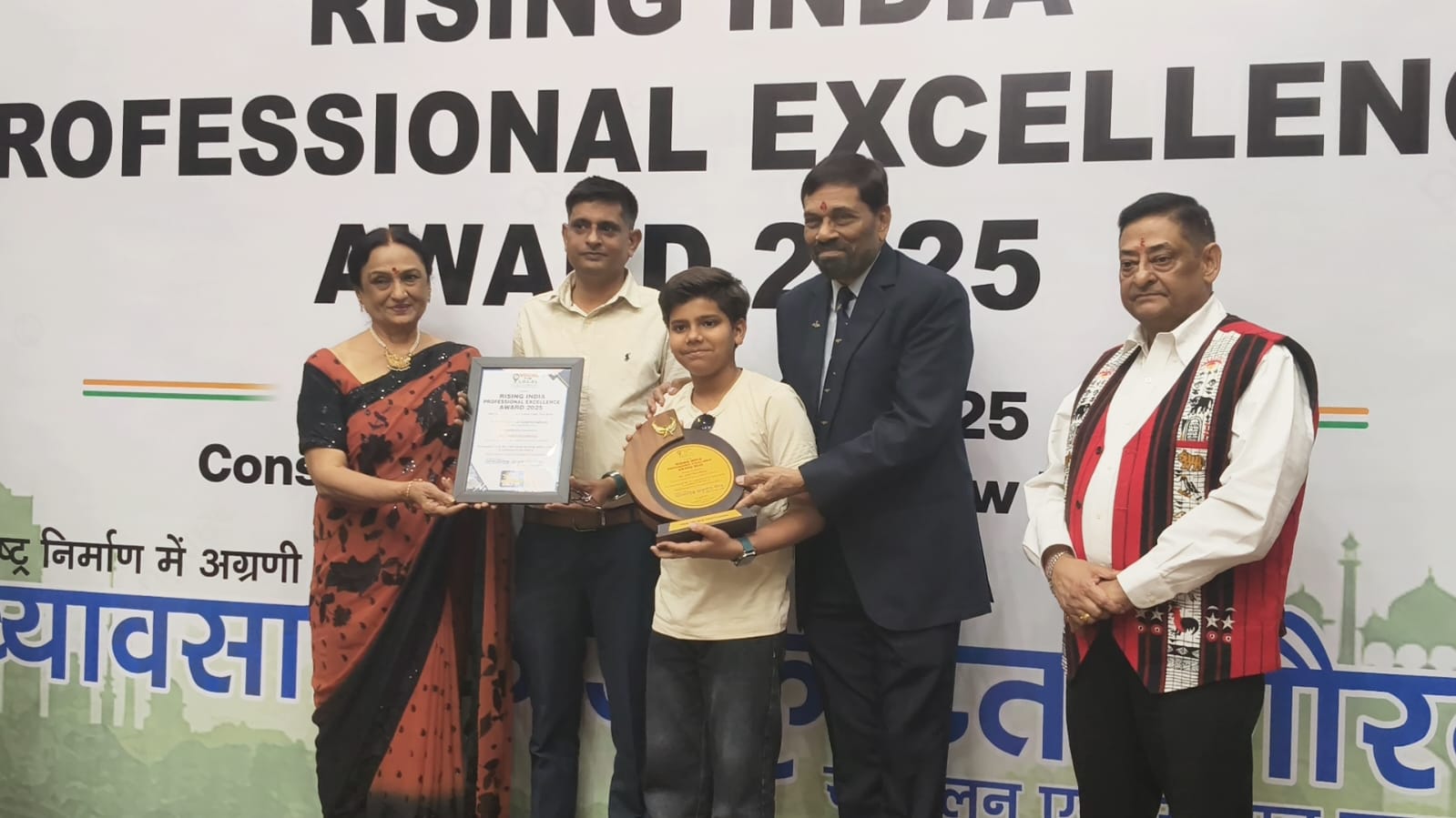Anil Chaudhary, Founder of Farmonics India, receiving the Rising India Professional Excellence Award 2025 at the Constitution Club of India, New Delhi